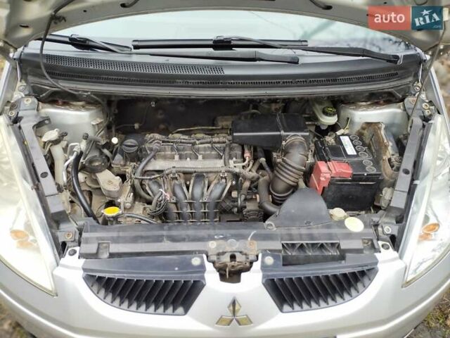 Мицубиси Кольт 2004 в Катеринополе на Automoto.ua Серый Мицубиси Кольт, объемом двигателя 1.33 л и пробегом 192 тыс. км за 3700 $, фото 20 на Automoto.ua