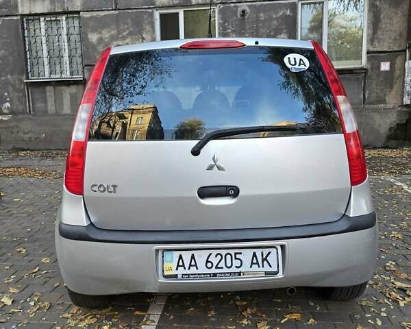 Міцубісі Кольт 2004 у Кам'янське (Дніпродзержинськ) на Automoto.ua Сірий Міцубісі Кольт, об'ємом двигуна 1.3 л та пробігом 170 тис. км за 4400 $, фото 5 на Automoto.ua