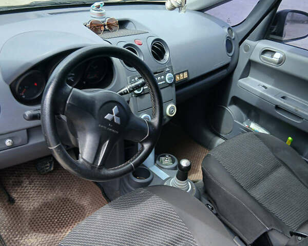 Сірий Міцубісі Кольт, об'ємом двигуна 1.33 л та пробігом 251 тис. км за 2600 $, фото 15 на Automoto.ua