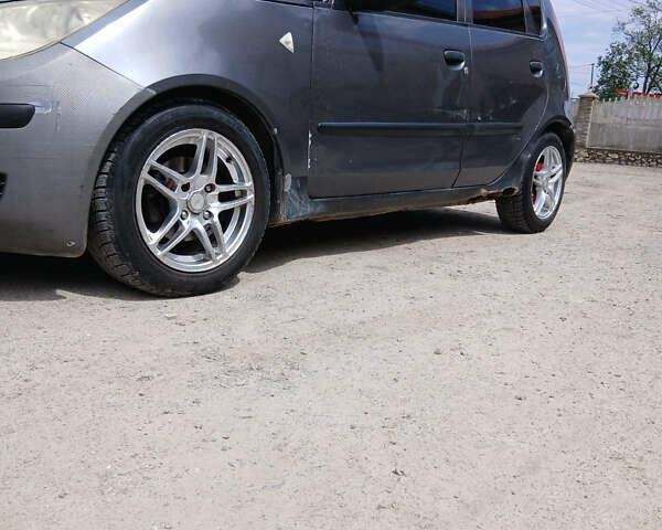 Сірий Міцубісі Кольт, об'ємом двигуна 1.33 л та пробігом 251 тис. км за 2600 $, фото 1 на Automoto.ua