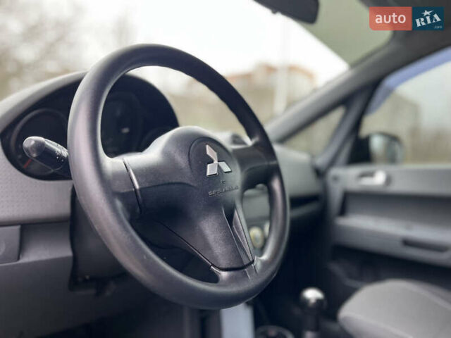 Сірий Міцубісі Кольт, об'ємом двигуна 1.33 л та пробігом 144 тис. км за 4999 $, фото 7 на Automoto.ua