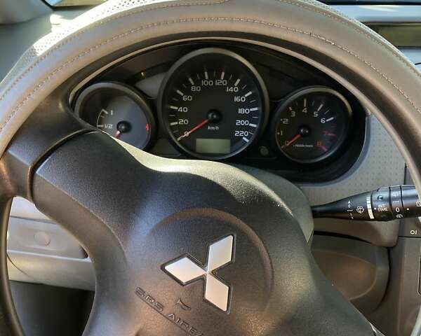 Сірий Міцубісі Кольт, об'ємом двигуна 1.3 л та пробігом 188 тис. км за 4100 $, фото 18 на Automoto.ua