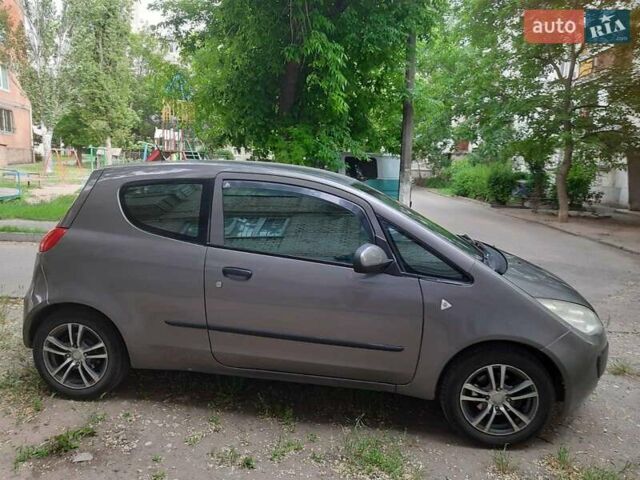 Серый Мицубиси Кольт, объемом двигателя 1.3 л и пробегом 186 тыс. км за 3100 $, фото 6 на Automoto.ua
