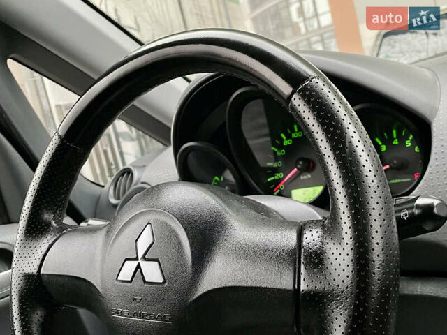 Сірий Міцубісі Кольт, об'ємом двигуна 1.3 л та пробігом 198 тис. км за 3250 $, фото 12 на Automoto.ua