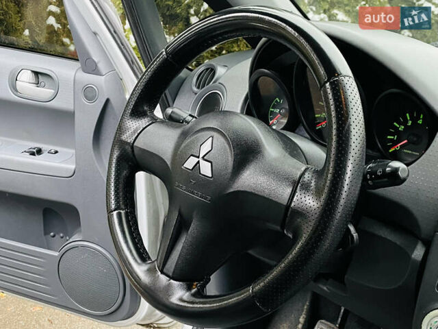 Сірий Міцубісі Кольт, об'ємом двигуна 1.3 л та пробігом 198 тис. км за 3250 $, фото 17 на Automoto.ua