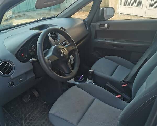 Сірий Міцубісі Кольт, об'ємом двигуна 1.33 л та пробігом 153 тис. км за 3500 $, фото 14 на Automoto.ua