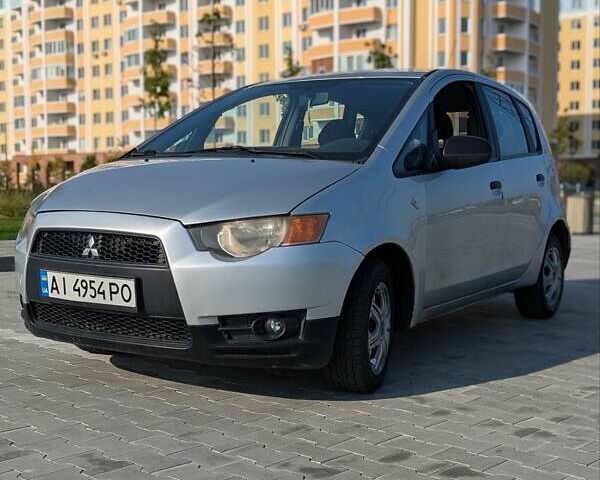 Серый Мицубиси Кольт, объемом двигателя 1.12 л и пробегом 252 тыс. км за 3900 $, фото 2 на Automoto.ua