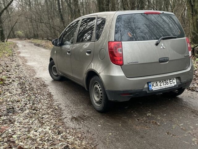 Серый Мицубиси Кольт, объемом двигателя 1.3 л и пробегом 340 тыс. км за 5000 $, фото 3 на Automoto.ua