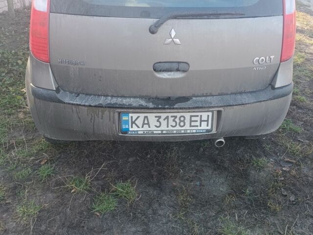 Серый Мицубиси Кольт, объемом двигателя 1.3 л и пробегом 147 тыс. км за 3850 $, фото 3 на Automoto.ua