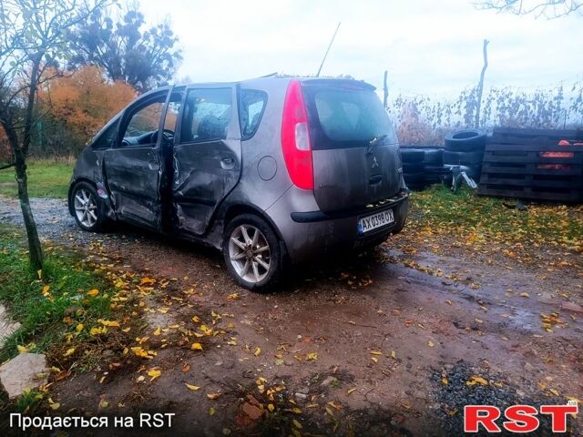 Сірий Міцубісі Кольт, об'ємом двигуна 1.3 л та пробігом 200 тис. км за 1299 $, фото 3 на Automoto.ua