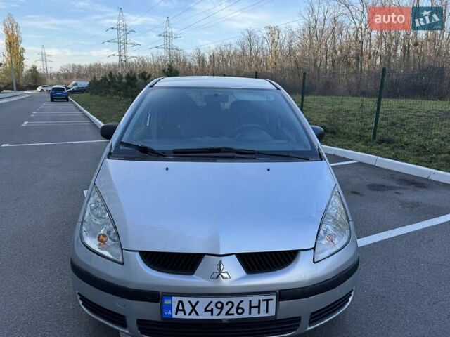 Серый Мицубиси Кольт, объемом двигателя 1.33 л и пробегом 143 тыс. км за 4500 $, фото 2 на Automoto.ua