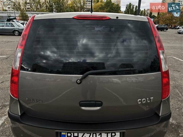 Серый Мицубиси Кольт, объемом двигателя 1.33 л и пробегом 104 тыс. км за 5999 $, фото 3 на Automoto.ua