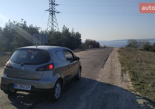 Серый Мицубиси Кольт, объемом двигателя 1.3 л и пробегом 220 тыс. км за 6900 $, фото 5 на Automoto.ua