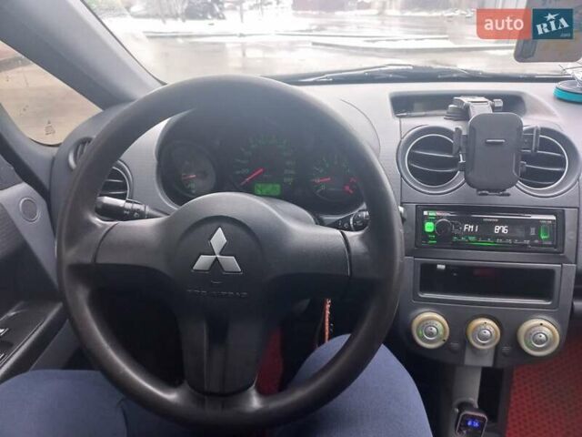 Серый Мицубиси Кольт, объемом двигателя 1.33 л и пробегом 188 тыс. км за 2750 $, фото 13 на Automoto.ua