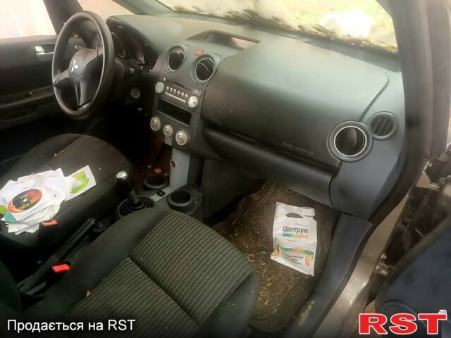 Сірий Міцубісі Кольт, об'ємом двигуна 1.3 л та пробігом 200 тис. км за 1299 $, фото 9 на Automoto.ua