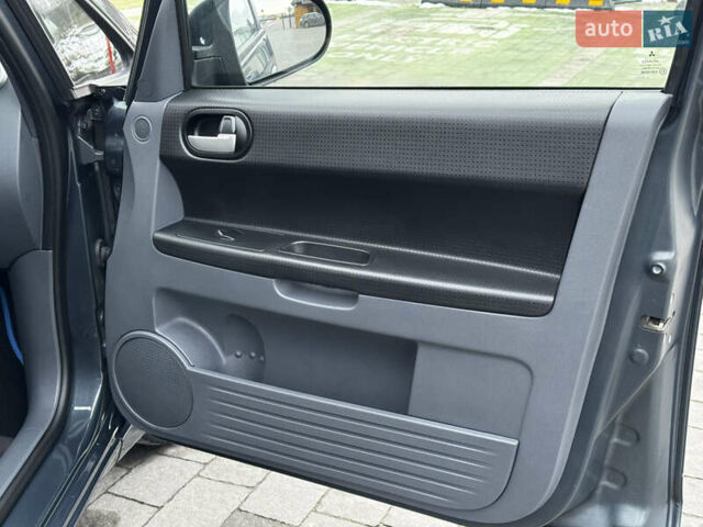 Сірий Міцубісі Кольт, об'ємом двигуна 1.33 л та пробігом 158 тис. км за 7500 $, фото 41 на Automoto.ua
