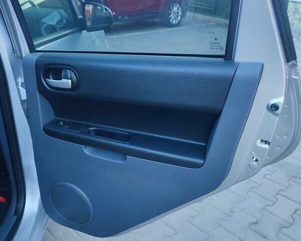 Серый Мицубиси Кольт, объемом двигателя 1.3 л и пробегом 150 тыс. км за 3750 $, фото 7 на Automoto.ua