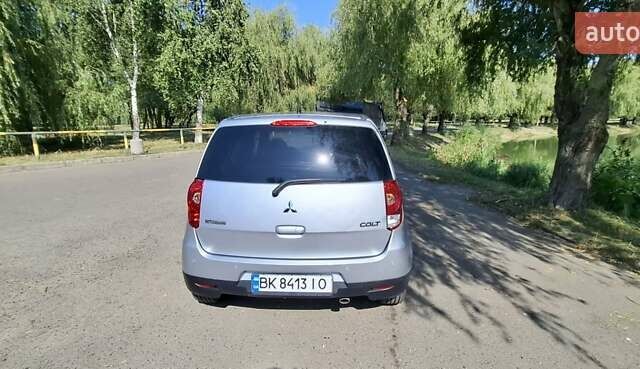 Мицубиси Кольт 2011 в Ровно на Automoto.ua Серый Мицубиси Кольт, объемом двигателя 1.33 л и пробегом 210 тыс. км за 6400 $, фото 9 на Automoto.ua