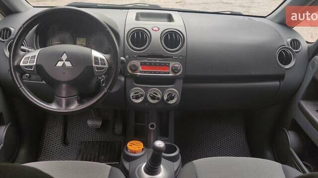 Сірий Міцубісі Кольт, об'ємом двигуна 1.33 л та пробігом 71 тис. км за 7800 $, фото 12 на Automoto.ua