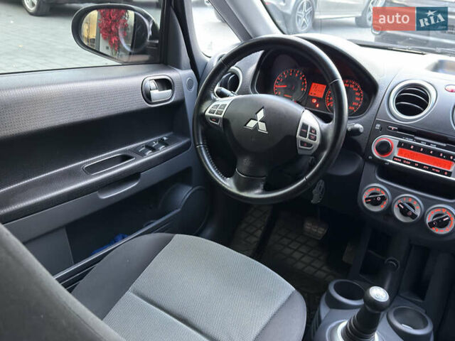 Мицубиси Кольт 2012 в Черновцах на Automoto.ua Серый Мицубиси Кольт, объемом двигателя 1.33 л и пробегом 127 тыс. км за 7200 $, фото 10 на Automoto.ua