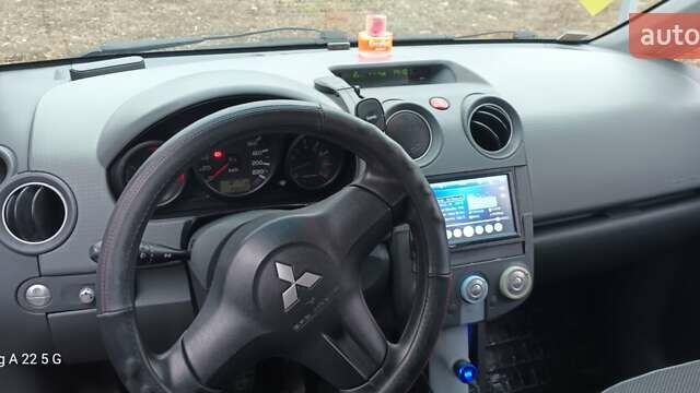 Серый Мицубиси Кольт, объемом двигателя 1.5 л и пробегом 238 тыс. км за 4700 $, фото 11 на Automoto.ua
