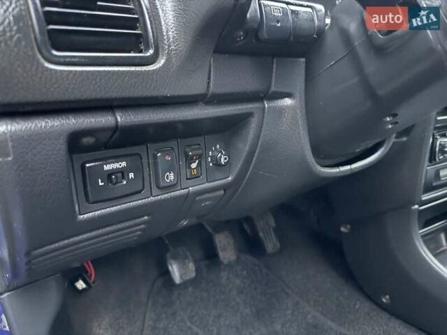 Синій Міцубісі Кольт, об'ємом двигуна 1 л та пробігом 166 тис. км за 1700 $, фото 17 на Automoto.ua