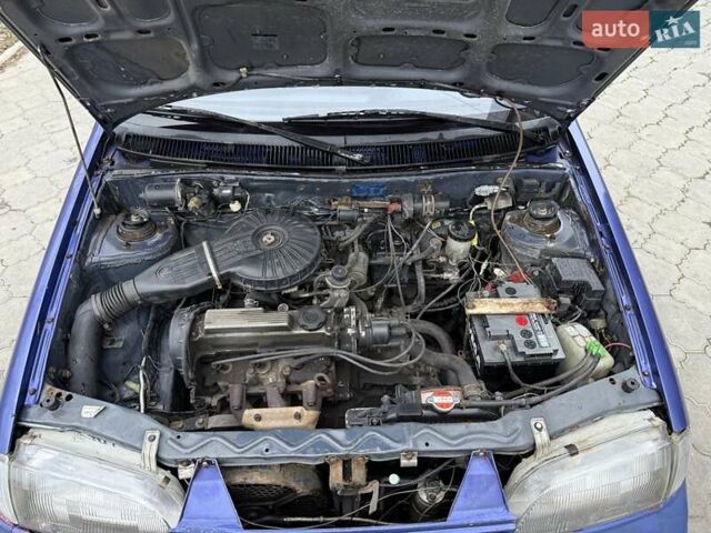 Синій Міцубісі Кольт, об'ємом двигуна 1 л та пробігом 166 тис. км за 1700 $, фото 16 на Automoto.ua