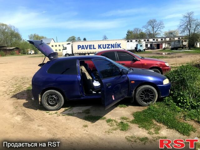 Синий Мицубиси Кольт, объемом двигателя 1.3 л и пробегом 350 тыс. км за 1000 $, фото 1 на Automoto.ua