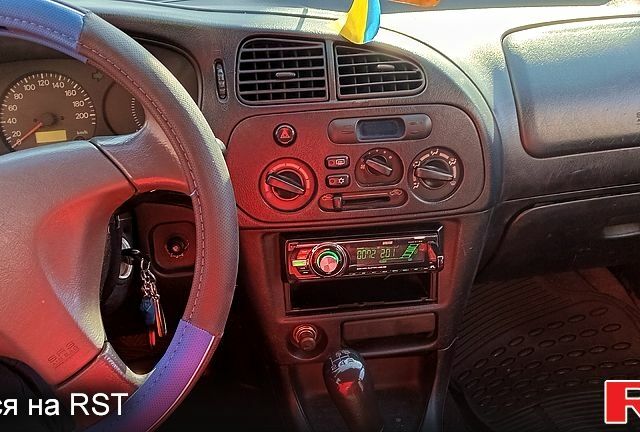 Синий Мицубиси Кольт, объемом двигателя 1.3 л и пробегом 456 тыс. км за 1000 $, фото 8 на Automoto.ua