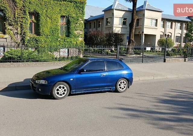 Синій Міцубісі Кольт, об'ємом двигуна 1.3 л та пробігом 255 тис. км за 2200 $, фото 7 на Automoto.ua