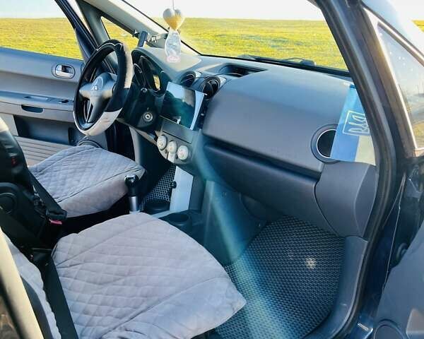 Синий Мицубиси Кольт, объемом двигателя 1.2 л и пробегом 188 тыс. км за 4150 $, фото 10 на Automoto.ua