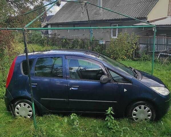 Синій Міцубісі Кольт, об'ємом двигуна 1.33 л та пробігом 250 тис. км за 3400 $, фото 7 на Automoto.ua