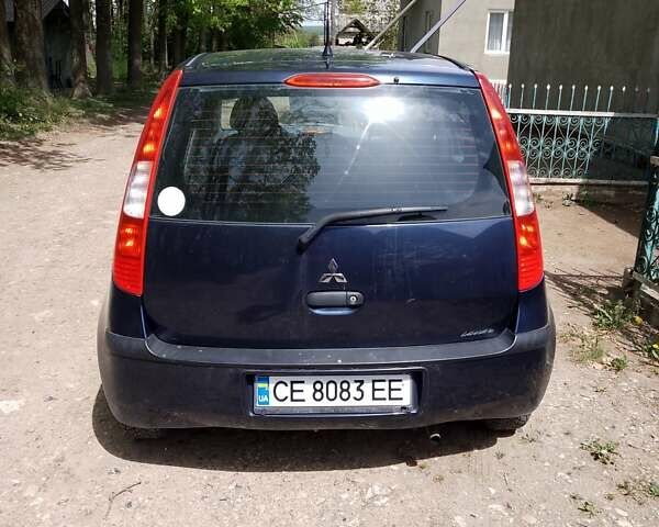 Синій Міцубісі Кольт, об'ємом двигуна 1.12 л та пробігом 269 тис. км за 4000 $, фото 6 на Automoto.ua