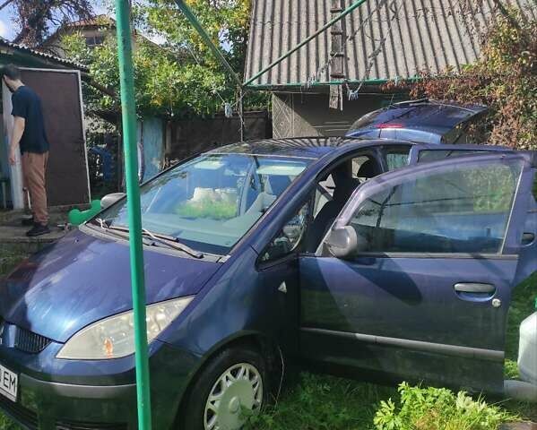 Синій Міцубісі Кольт, об'ємом двигуна 1.33 л та пробігом 250 тис. км за 3400 $, фото 10 на Automoto.ua