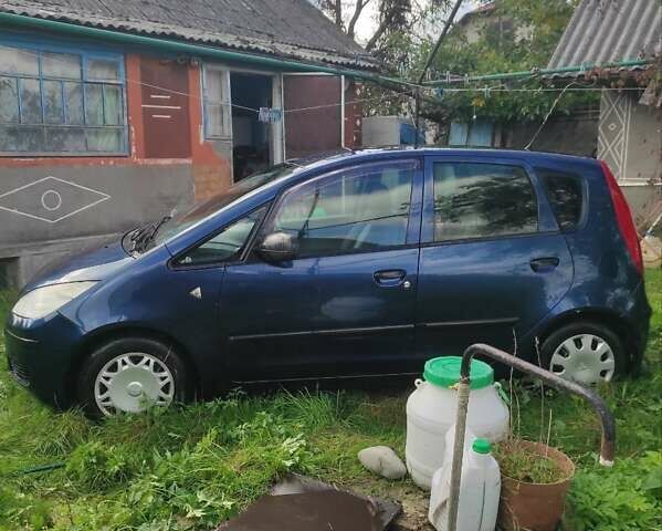 Синій Міцубісі Кольт, об'ємом двигуна 1.33 л та пробігом 250 тис. км за 3400 $, фото 3 на Automoto.ua