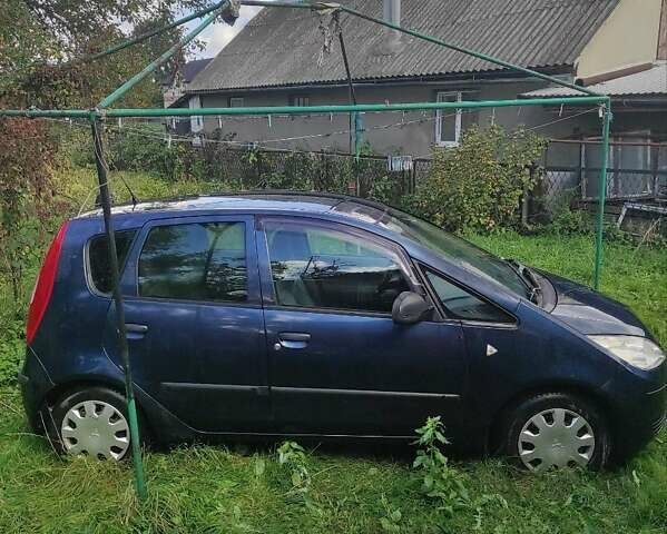 Синій Міцубісі Кольт, об'ємом двигуна 1.33 л та пробігом 250 тис. км за 3400 $, фото 9 на Automoto.ua
