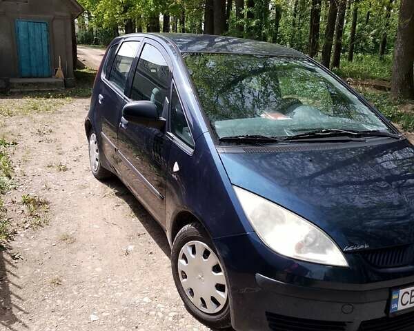 Синій Міцубісі Кольт, об'ємом двигуна 1.12 л та пробігом 269 тис. км за 4000 $, фото 3 на Automoto.ua