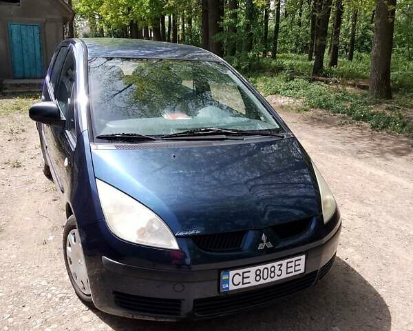 Синій Міцубісі Кольт, об'ємом двигуна 1.12 л та пробігом 269 тис. км за 4000 $, фото 2 на Automoto.ua