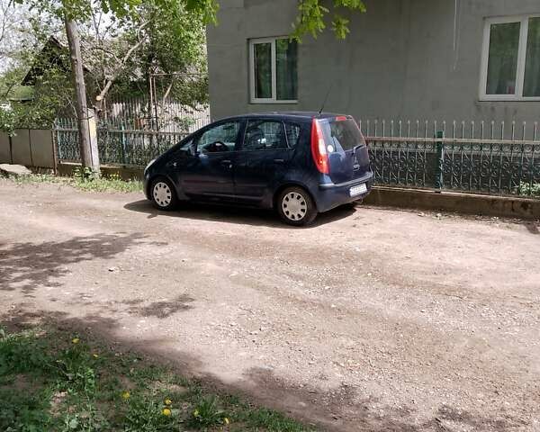 Синій Міцубісі Кольт, об'ємом двигуна 1.12 л та пробігом 269 тис. км за 4000 $, фото 1 на Automoto.ua