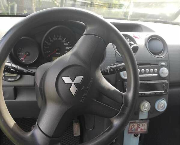 Синій Міцубісі Кольт, об'ємом двигуна 1.33 л та пробігом 250 тис. км за 3400 $, фото 18 на Automoto.ua