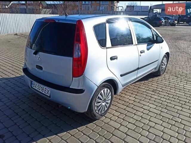 Синий Мицубиси Кольт, объемом двигателя 1.12 л и пробегом 205 тыс. км за 3600 $, фото 4 на Automoto.ua