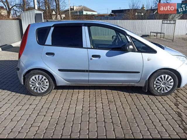 Синий Мицубиси Кольт, объемом двигателя 1.12 л и пробегом 205 тыс. км за 3600 $, фото 6 на Automoto.ua