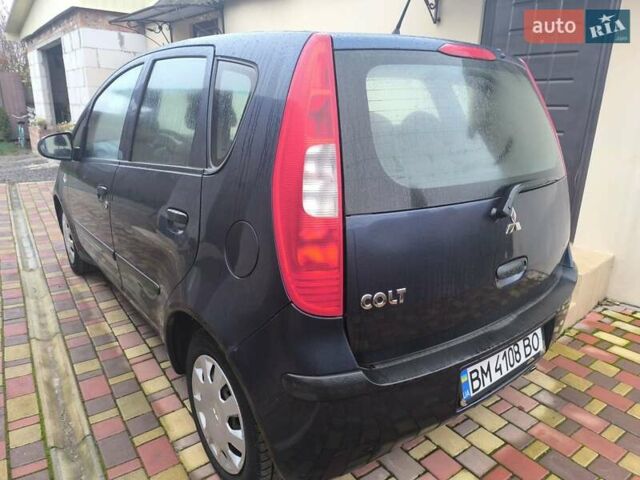 Синій Міцубісі Кольт, об'ємом двигуна 1.12 л та пробігом 106 тис. км за 3450 $, фото 3 на Automoto.ua