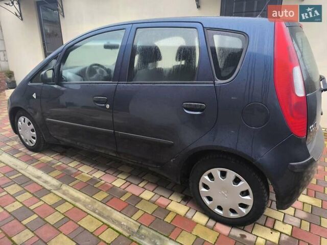 Синій Міцубісі Кольт, об'ємом двигуна 1.12 л та пробігом 106 тис. км за 3450 $, фото 9 на Automoto.ua