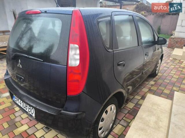 Синій Міцубісі Кольт, об'ємом двигуна 1.12 л та пробігом 106 тис. км за 3450 $, фото 4 на Automoto.ua