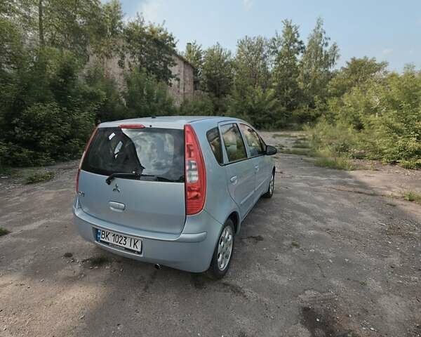 Синій Міцубісі Кольт, об'ємом двигуна 1.33 л та пробігом 170 тис. км за 5200 $, фото 9 на Automoto.ua