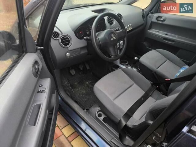 Синій Міцубісі Кольт, об'ємом двигуна 1.12 л та пробігом 106 тис. км за 3450 $, фото 12 на Automoto.ua