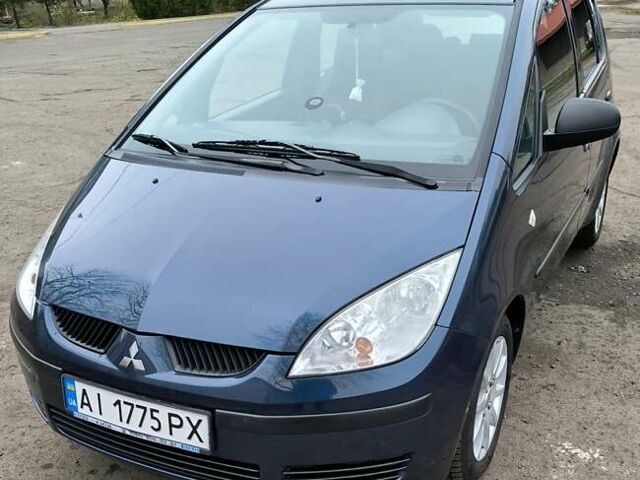 Синий Мицубиси Кольт, объемом двигателя 1.33 л и пробегом 100 тыс. км за 5500 $, фото 6 на Automoto.ua