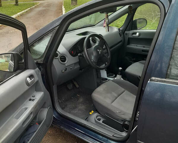 Синій Міцубісі Кольт, об'ємом двигуна 1.33 л та пробігом 214 тис. км за 4800 $, фото 9 на Automoto.ua