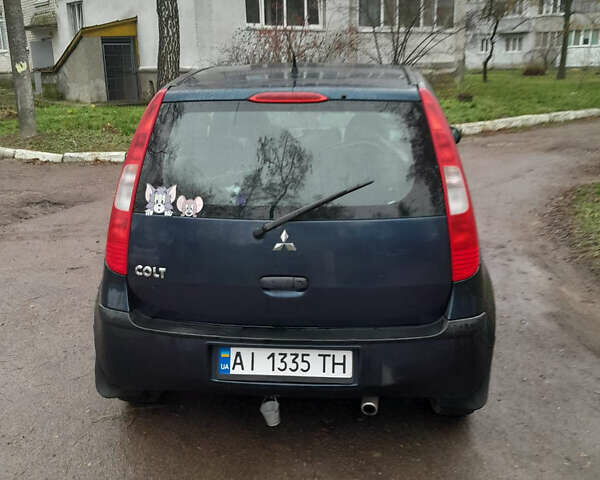 Синій Міцубісі Кольт, об'ємом двигуна 1.33 л та пробігом 214 тис. км за 4800 $, фото 2 на Automoto.ua